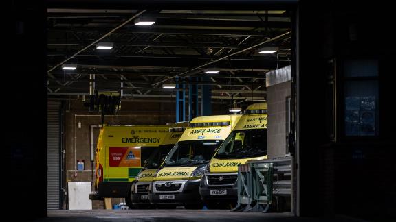 Ambulances parked inside a garage.