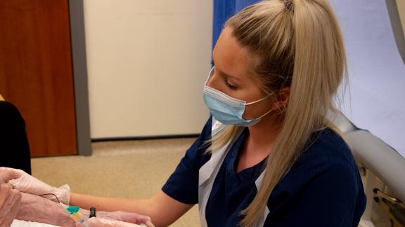 Nurse taking blood