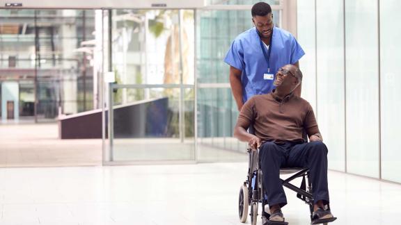 Nurse and patient in wheelchair